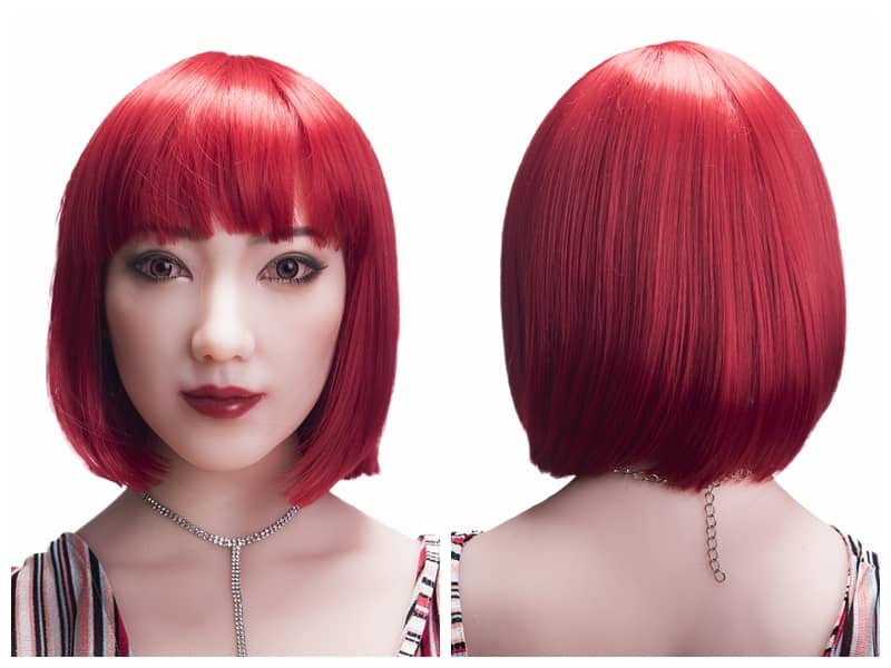 Red, trendy hairstyle with bangs